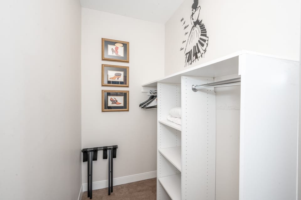 Ample closet space is available for clothes & bags​