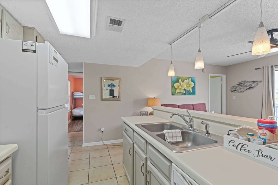 Fully equipped kitchen with easy access to bunk room and living area