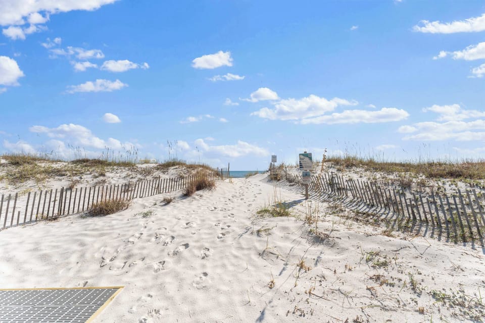 Direct access to sugar-white sand from the condo — no streets to cross, just pure beach bliss.
