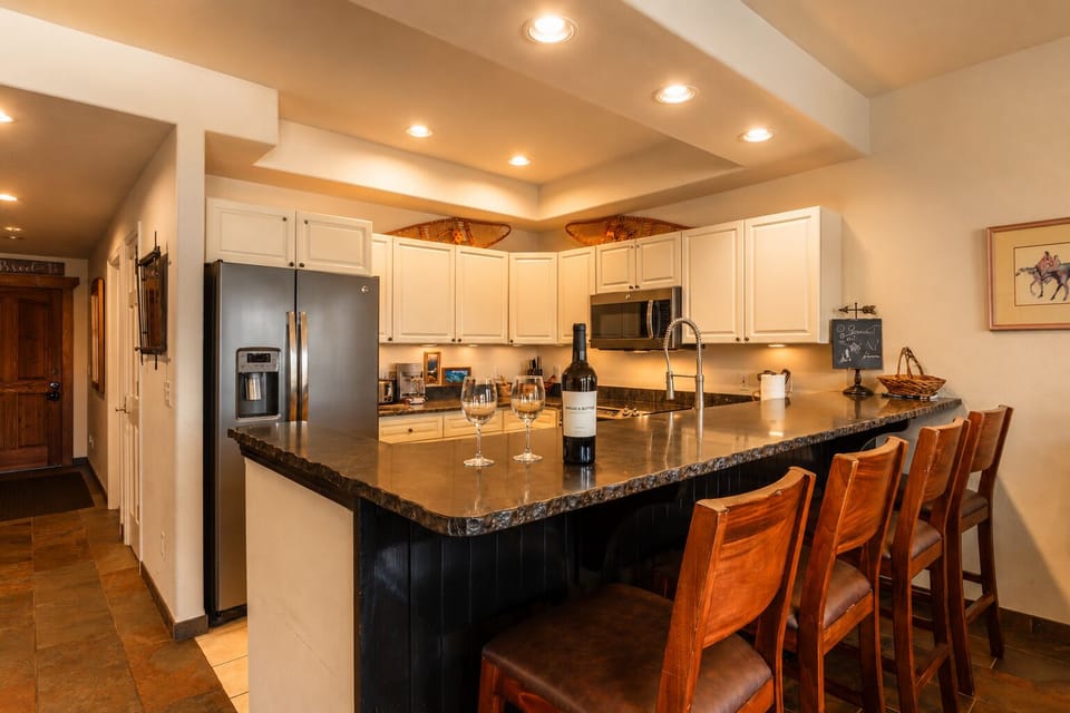 Cook, pour a drink, stay connected — the whole space flows together