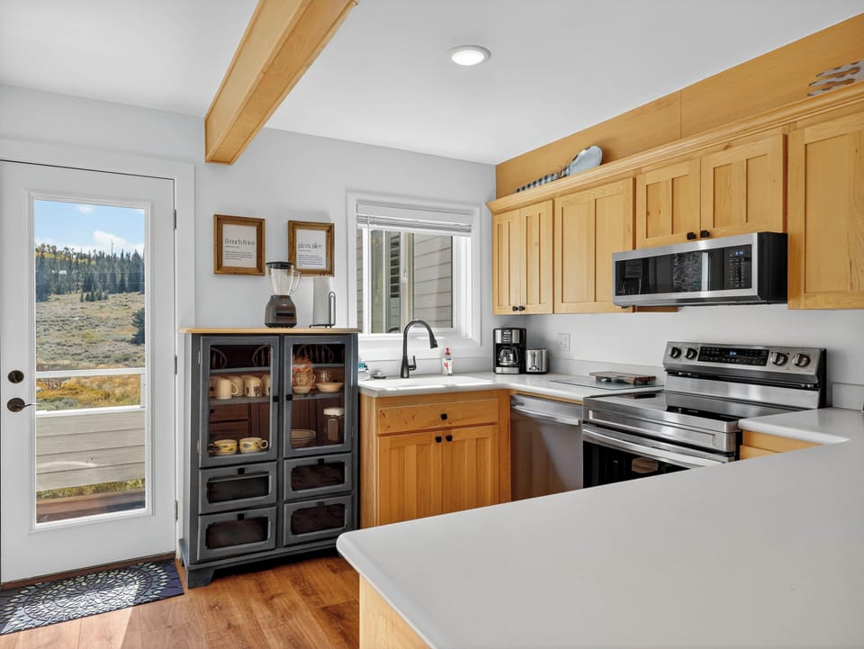 Fully equipped modern kitchen — everything you need to cook and enjoy meals on the mountain