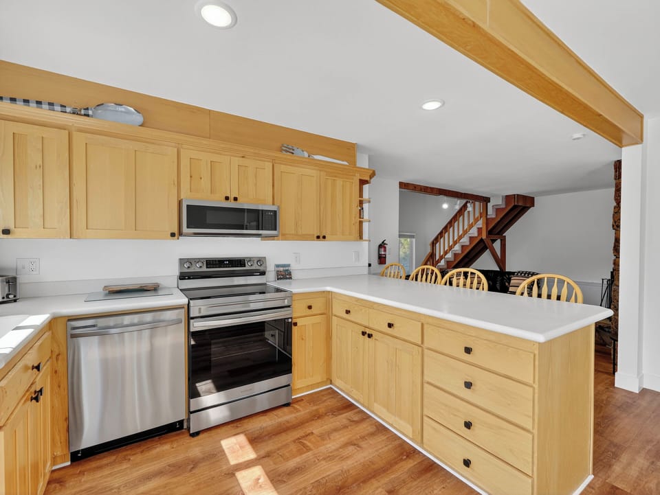 Fully equipped modern kitchen — everything you need to cook and enjoy meals on the mountain
