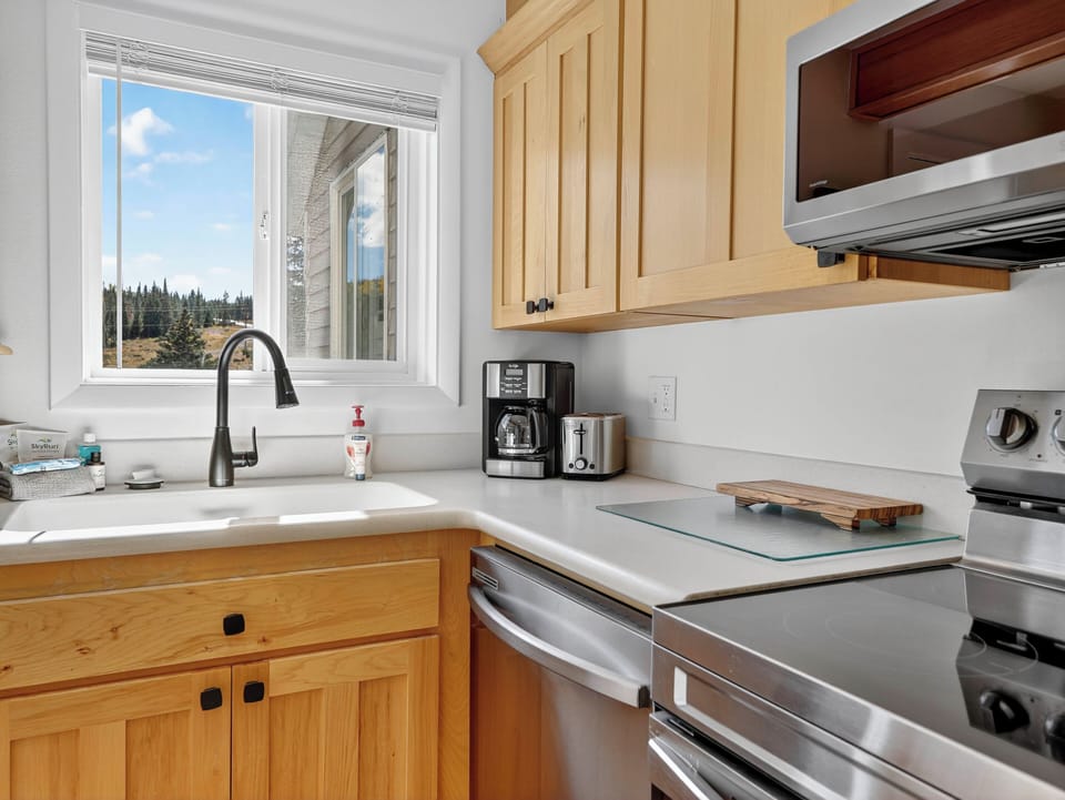 Fully equipped modern kitchen — everything you need to cook and enjoy meals on the mountain
