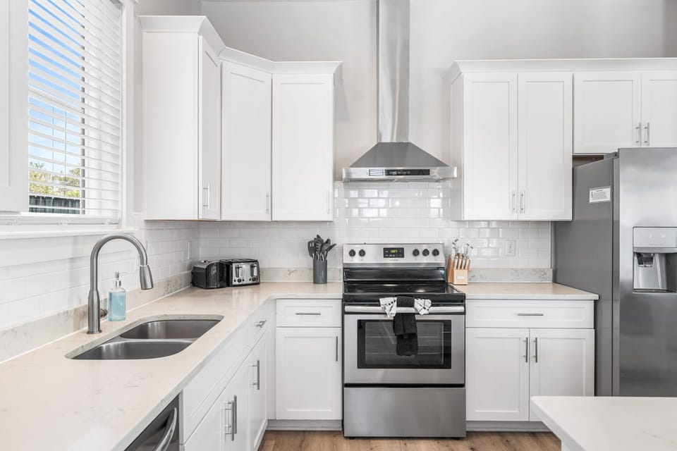 Crisp design and modern touches create a welcoming culinary retreat.
