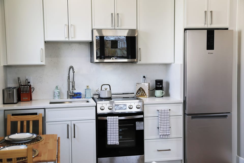 Enjoy a fully stocked kitchen with stainless appliances.