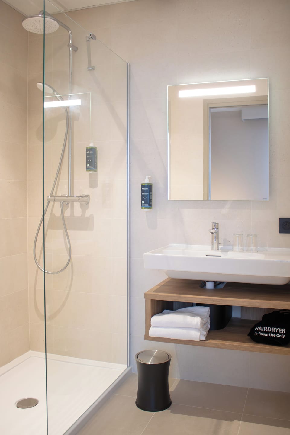 Eco-friendly toiletries, hair dryer, towels