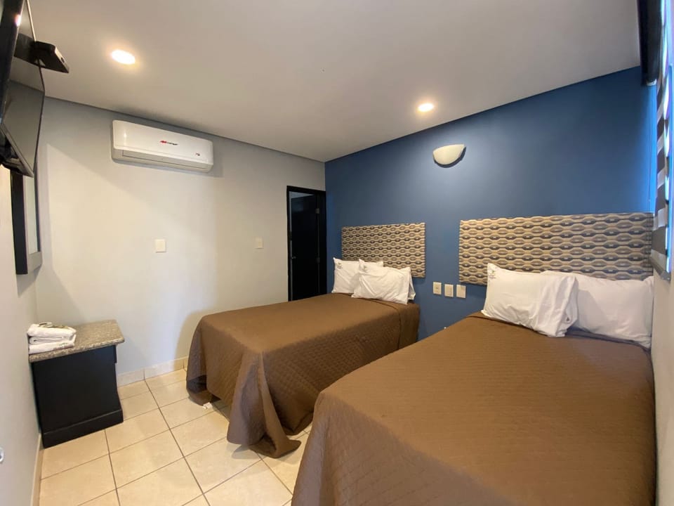 Room, 2 Twin Beds | Iron/ironing board, free WiFi, bed sheets, wheelchair access
