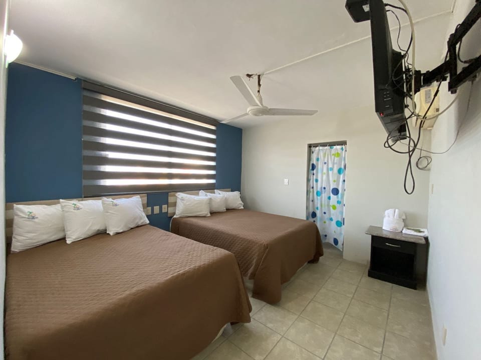 Room, 2 Double Beds | Iron/ironing board, free WiFi, bed sheets, wheelchair access