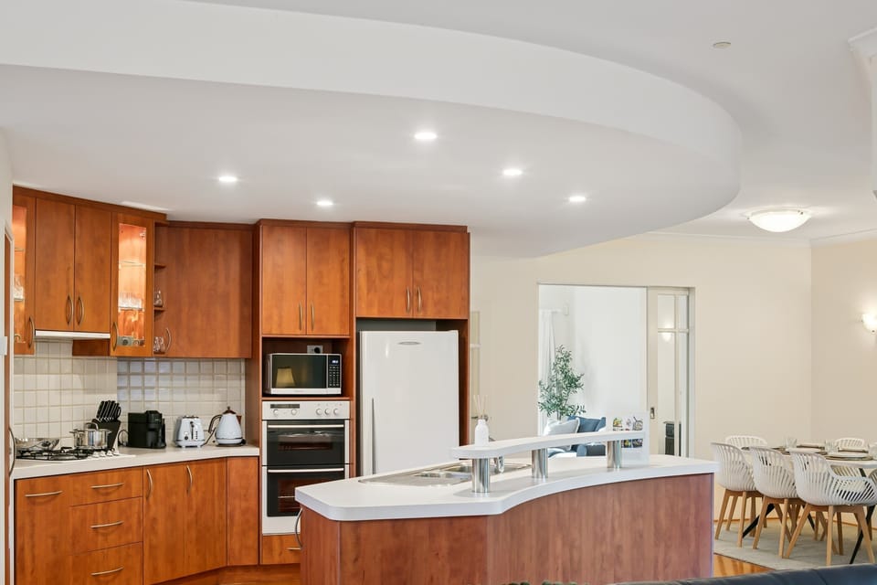 Spacious kitchen with easy access to the dining area.