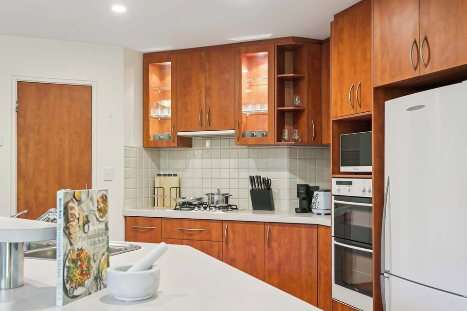 Clean and organized kitchen area designed for everyday cooking needs