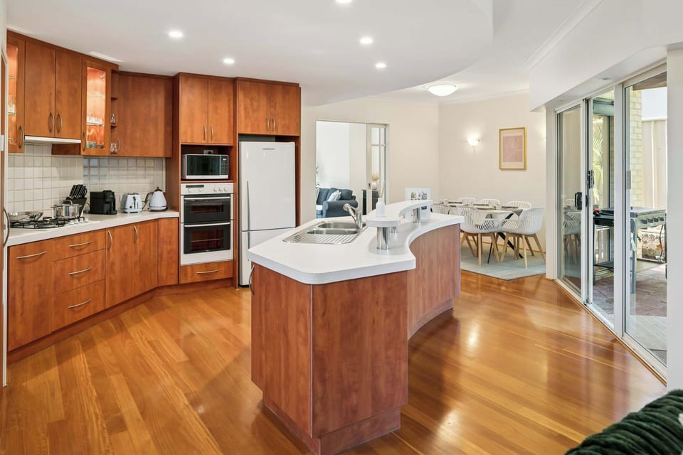 Modern kitchen with sleek countertops and quality fixtures.
