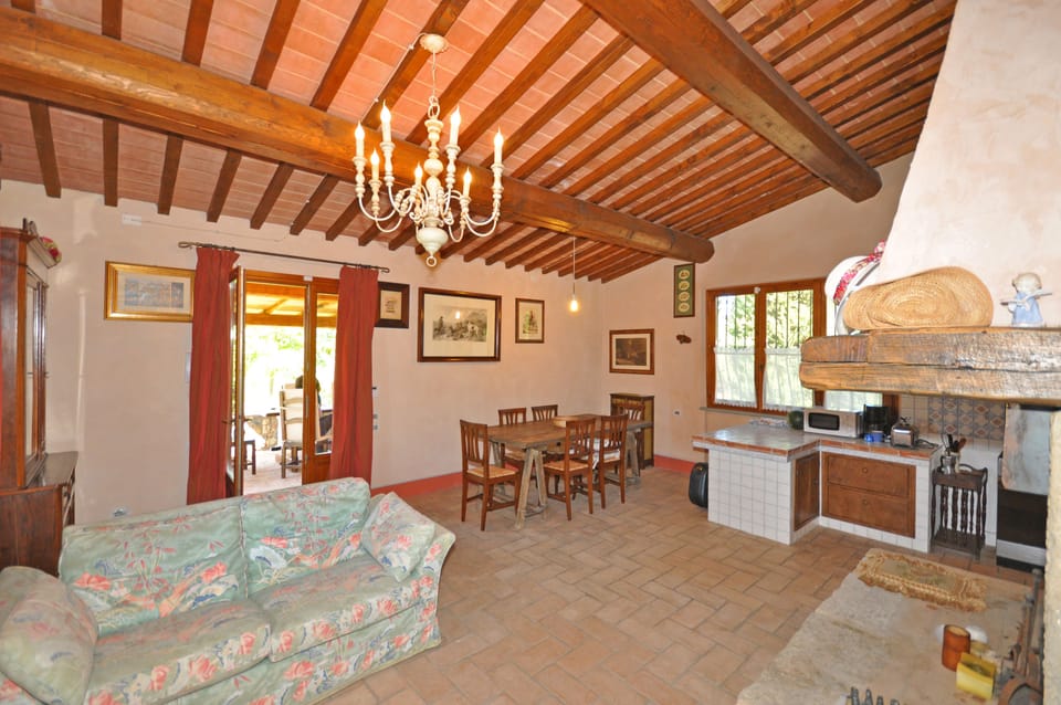 Panoramic Villa, 3 Bedrooms (Casa Cipressi) | Living area | Flat-screen TV, fireplace