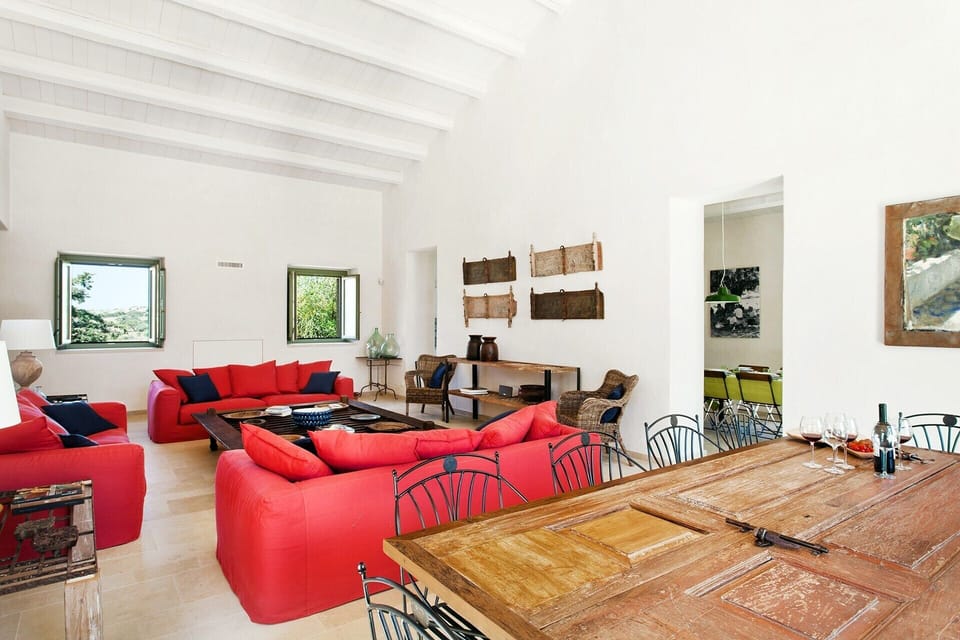 The generously proportioned, lofty-ceilinged main house living and dining area.
