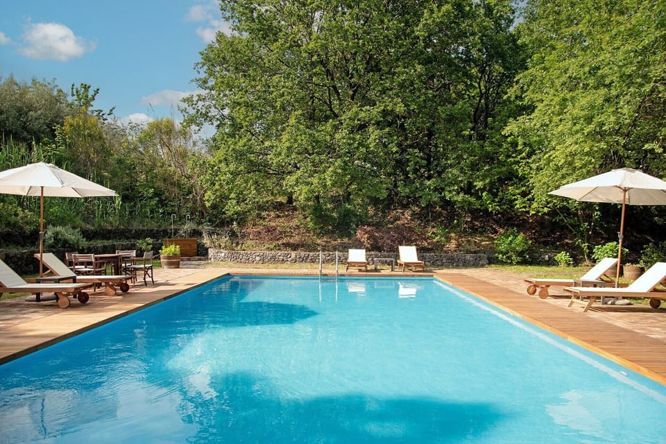 The pool is surrounded by the wonderful gardens.