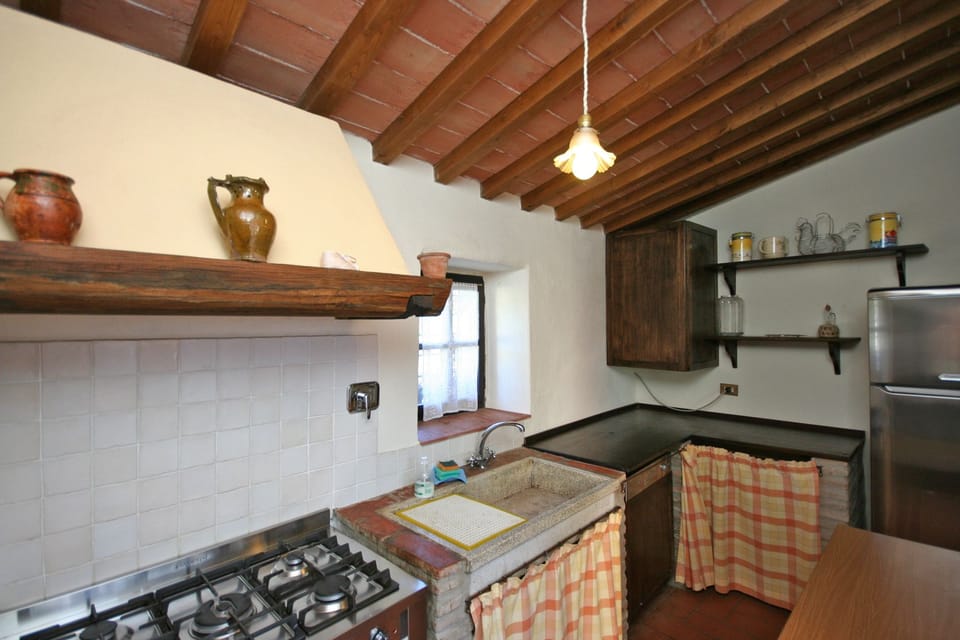 Panoramic Villa, Multiple Bedrooms (Villa Capolona) | Private kitchen | Full-size fridge, microwave, stovetop, coffee/tea maker