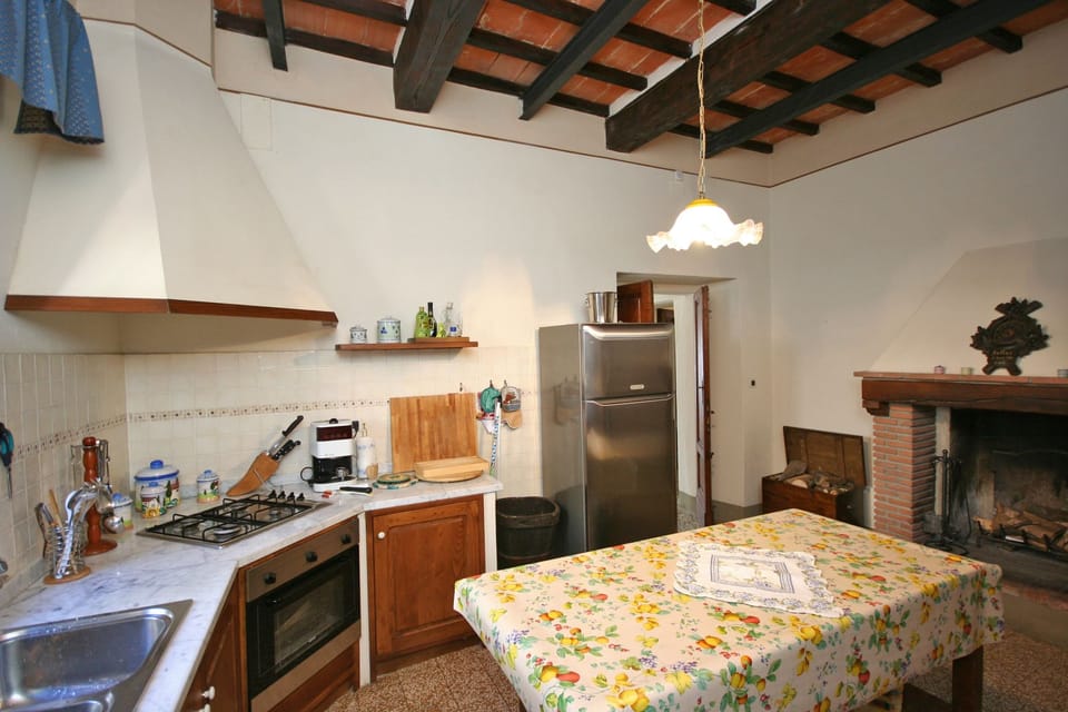 Panoramic Villa, Multiple Bedrooms (Villa Capolona) | Private kitchen | Full-size fridge, microwave, stovetop, coffee/tea maker