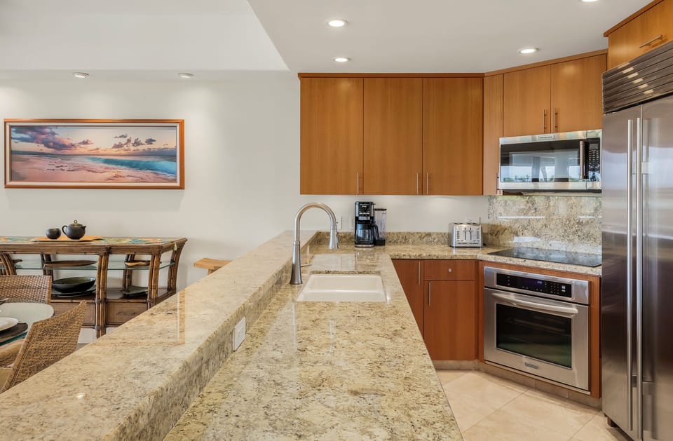 Beautiful granite countertops and fully equipped kitchen