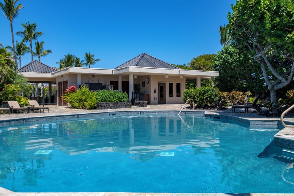 Spend a day relaxing poolside at the heated saltwater Mauna Lani Point pool.