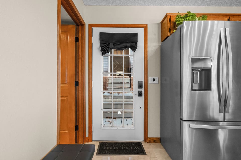 Front entry leads into open concept kitchen, living, & dining!
