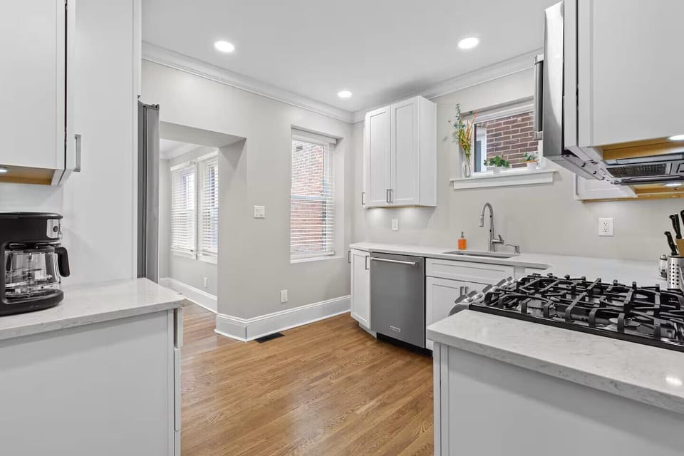 Fully stocked kitchen with appliances, cookware, coffee makers & baking items