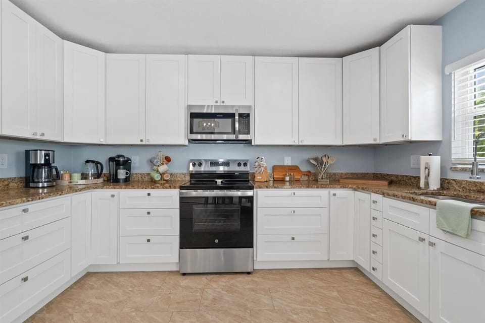 Fully stocked kitchen with Keurig and coffee station