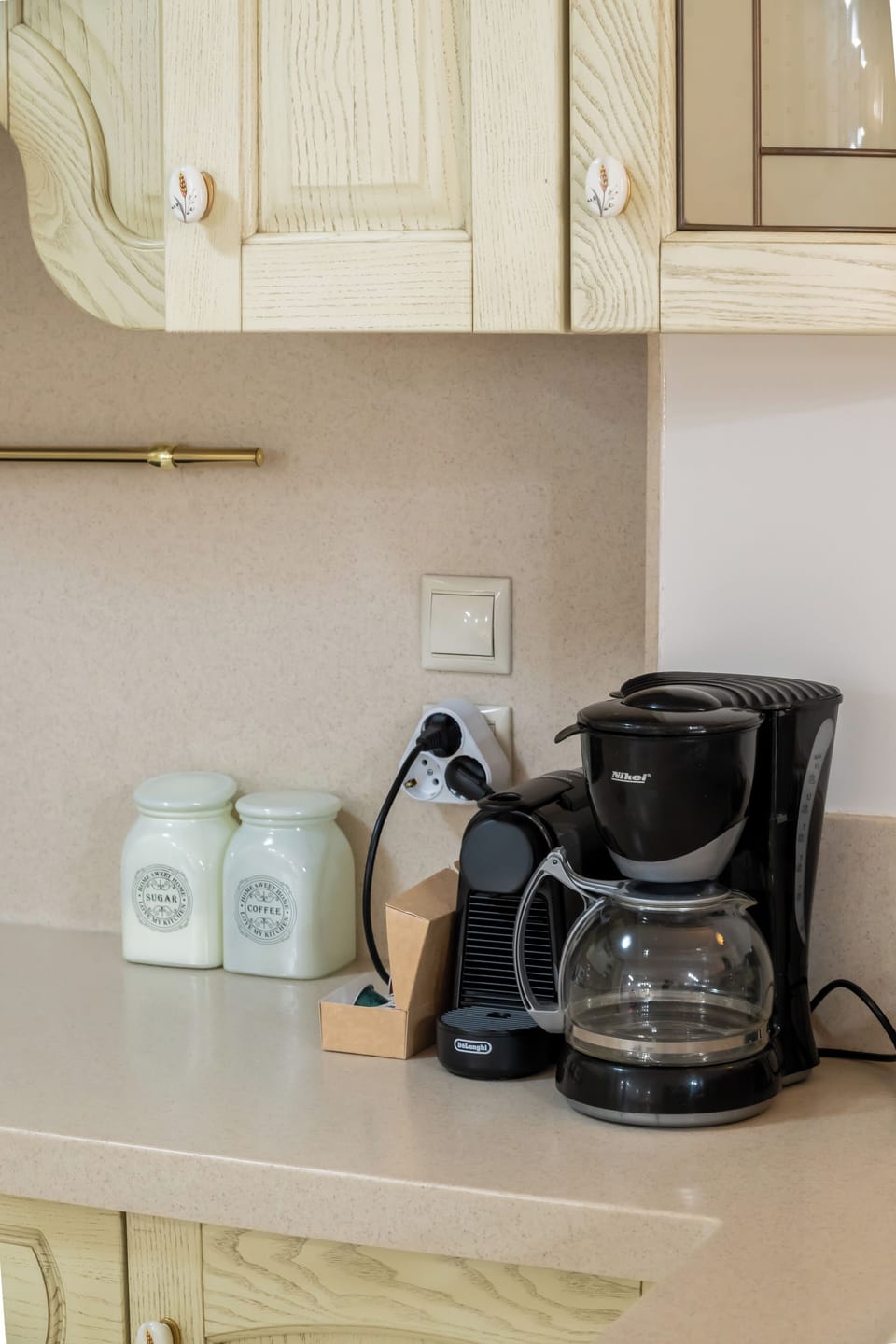 Well-equipped countertop featuring a coffee machine for your morning brew.