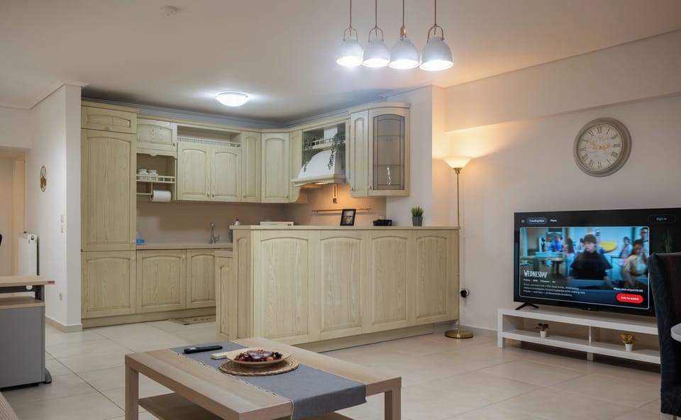 Bright open-plan kitchen and living area with modern amenities.