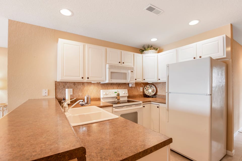 Condo, Multiple Beds, Patio (Tranquility Shores) | Private kitchen