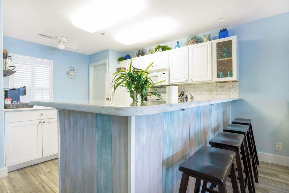 Condo, Multiple Beds, Balcony (A Wave From It All) | Private kitchen