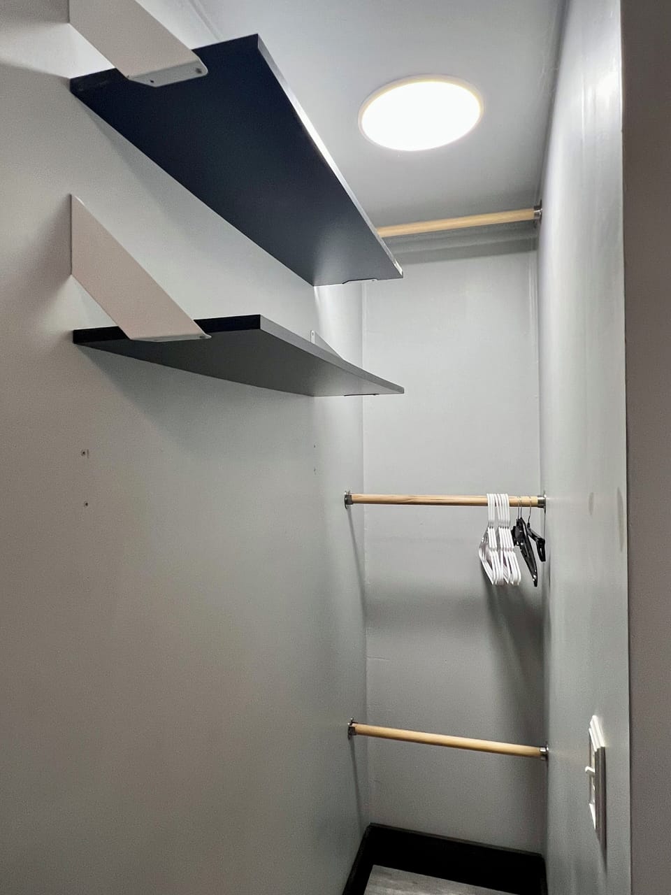 Each room has a small closet to hang clothes and store luggage 