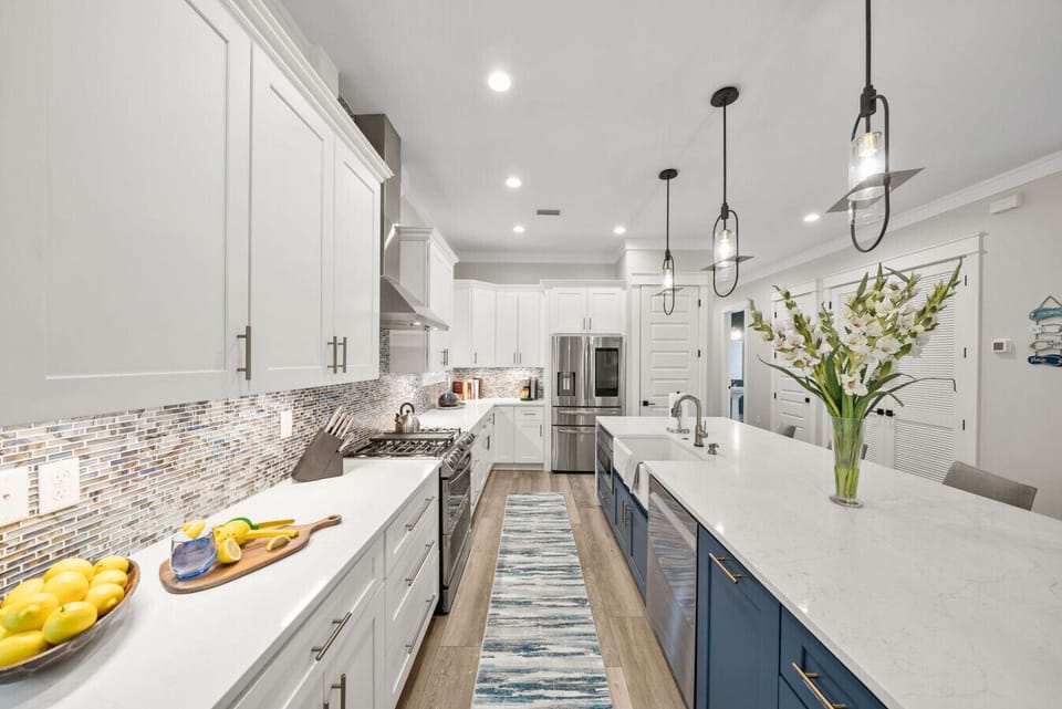 Spacious gourmet kitchen with high end appliances and fully stocked