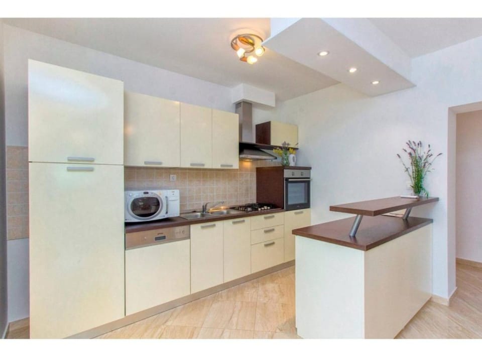 Villa (Four Bedroom Villa with the pool) | Private kitchen | Fridge