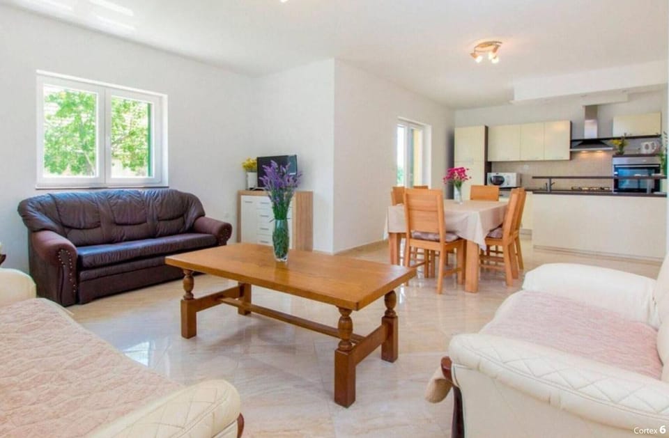 Villa (Four Bedroom Villa with the pool) | Living room | 32-inch flat-screen TV with cable channels, table tennis