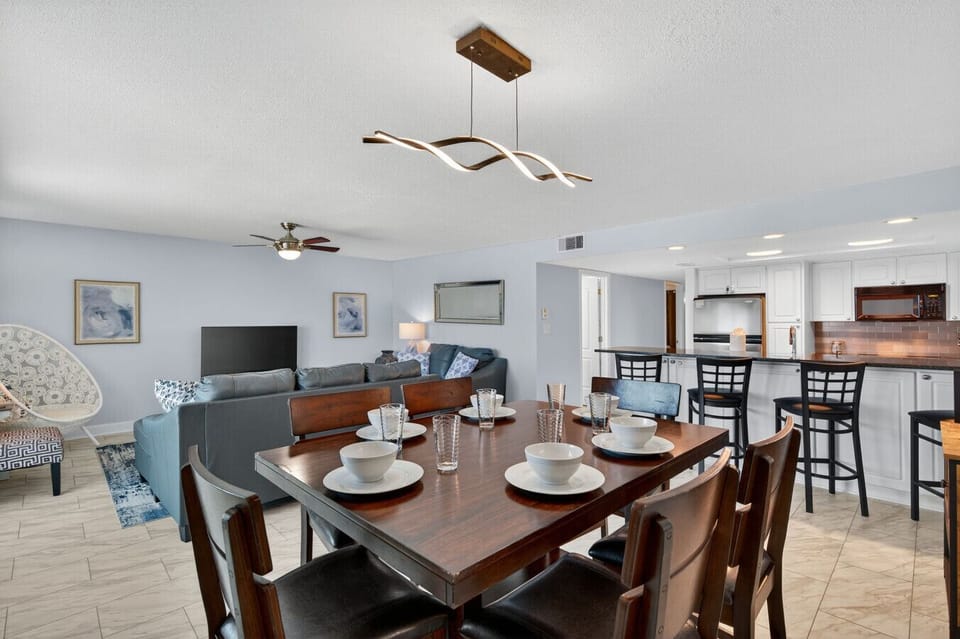 Open living & dining area perfect for shared meals, game nights & relaxed gatherings.