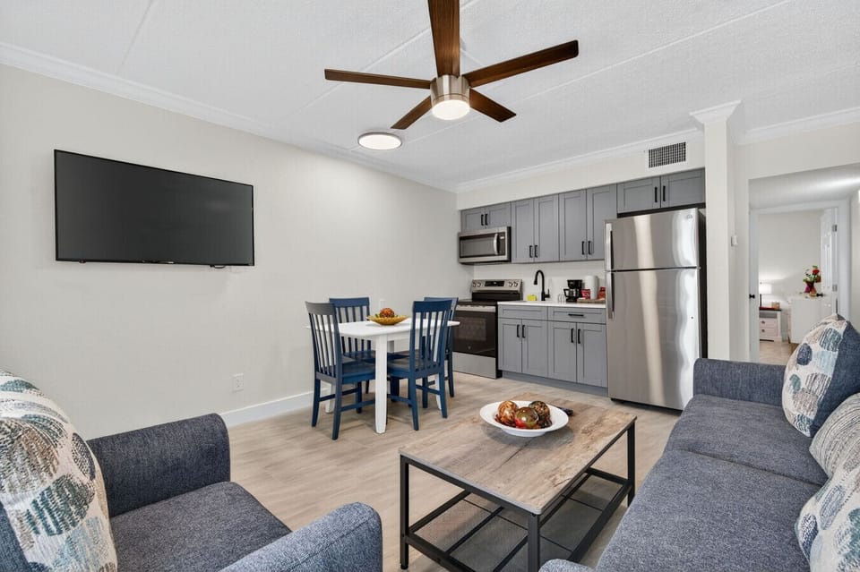 Open living & dining area w/ ceiling fan and easy flow for gathering together.