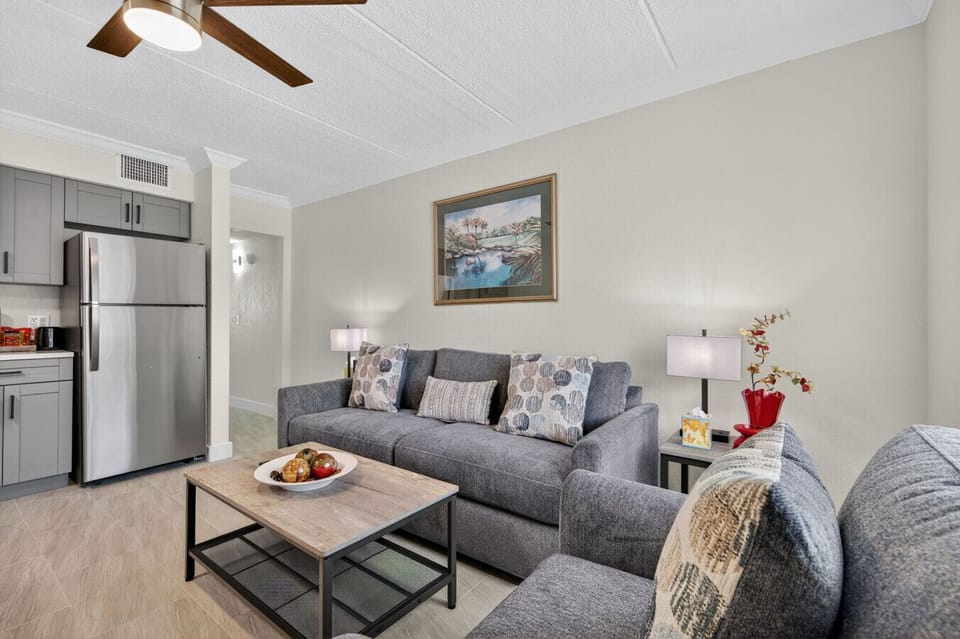 Open living area w/ comfy seating and easy flow into the kitchen for relaxed hangouts.