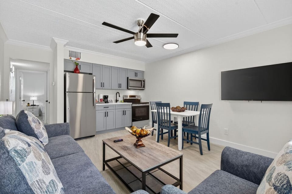 Open-concept kitchen, dining & living space designed for together time without feeling crowded.
