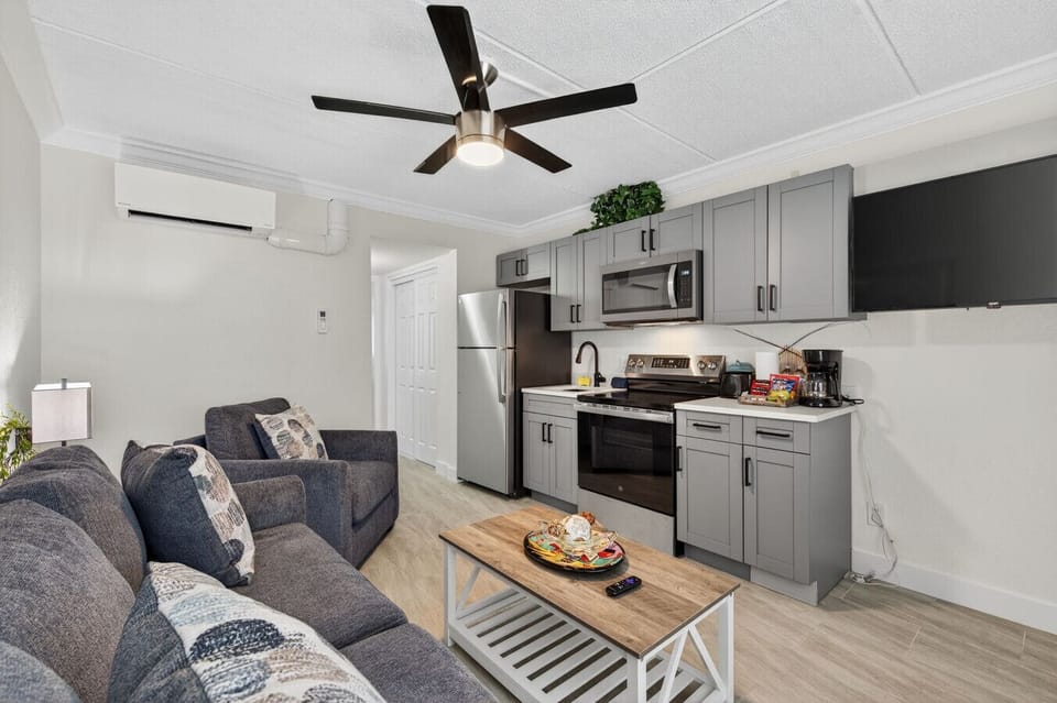 Inviting open-concept space combining living & kitchen for effortless gatherings