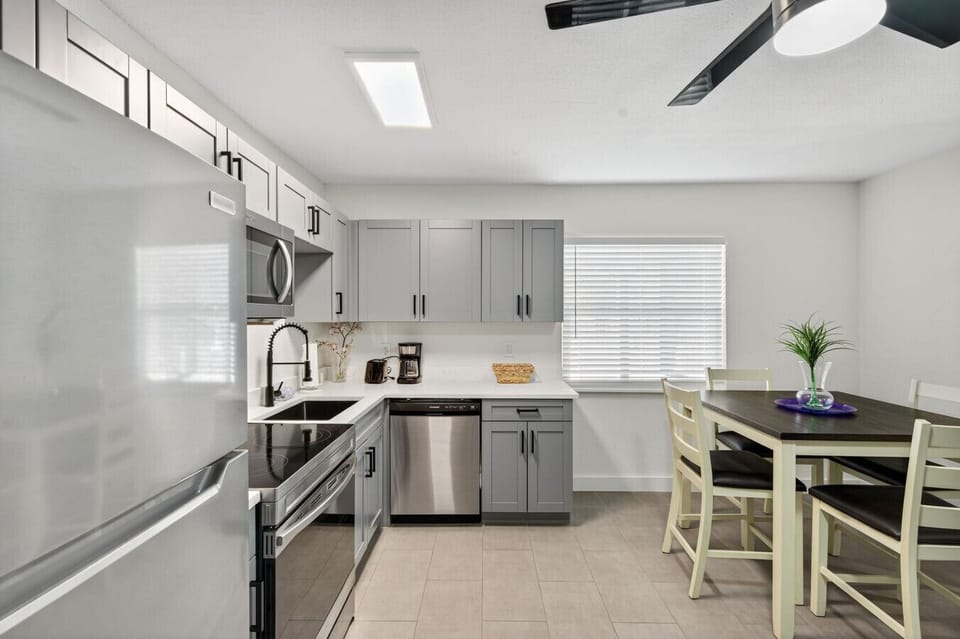 Open kitchen & dining layout designed for easy cooking & connection.