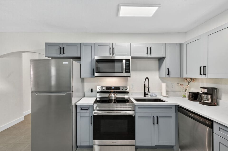 Clean, modern kitchen w/ stainless appliances & plenty of counter space.