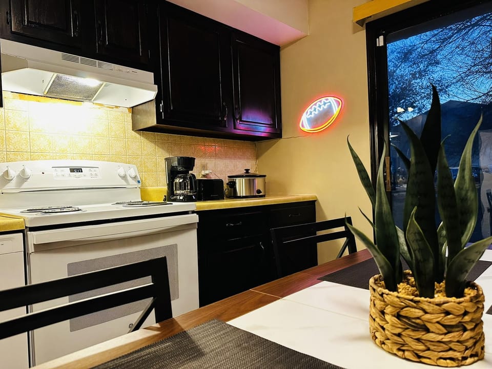 Cozy kitchen with modern appliances and warm lighting