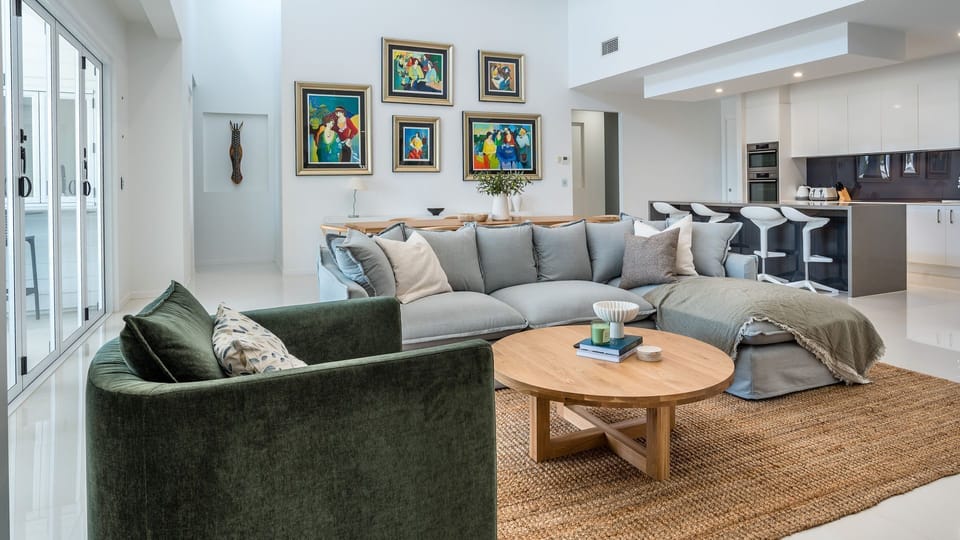 Spacious living area with comfortable seating and stylish decor.