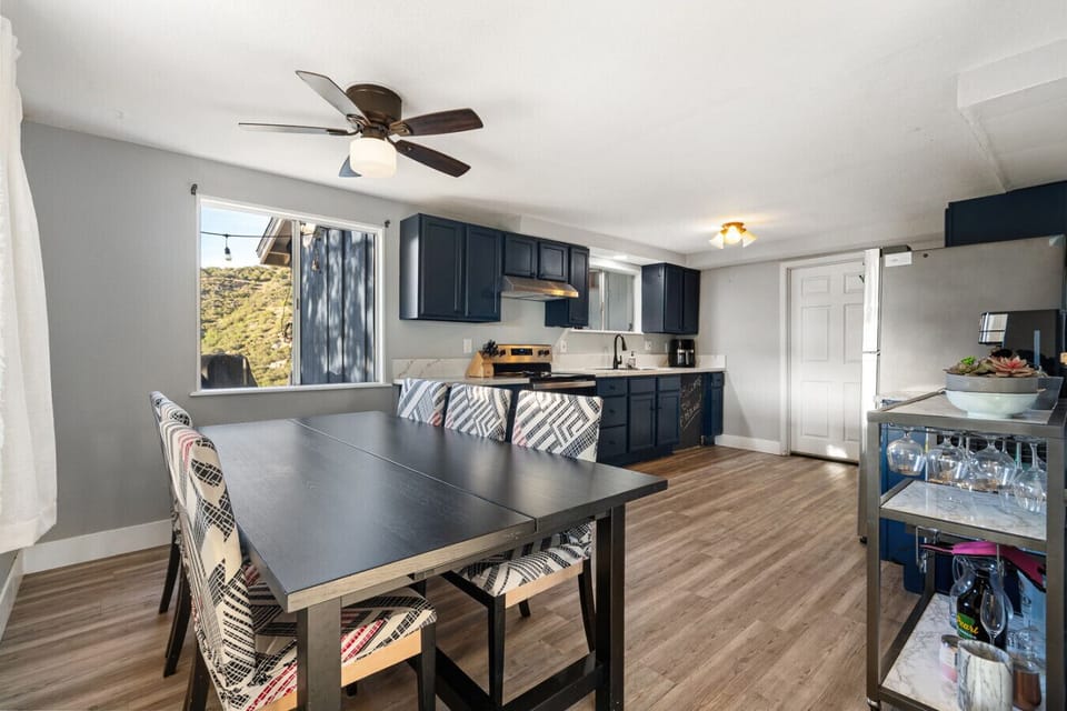 Dining table and fully stocked kitchen