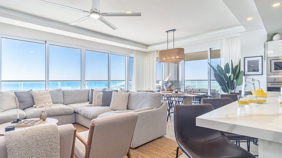 Wall to wall windows make the living room incredible.