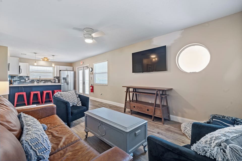 Whether you're hosting movie night or enjoying a quiet morning coffee, this space blends functionality with laid-back coastal charm.