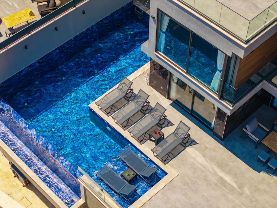 Stunning aerial view showing villa and pool