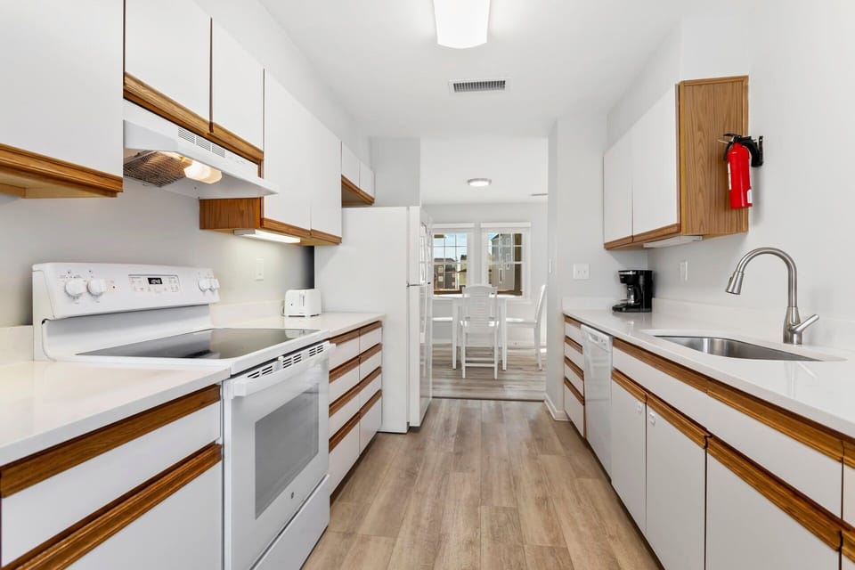 Prepare your favorite meals in the well-stocked kitchen with modern appliances, plenty of counter space, and all the essentials.