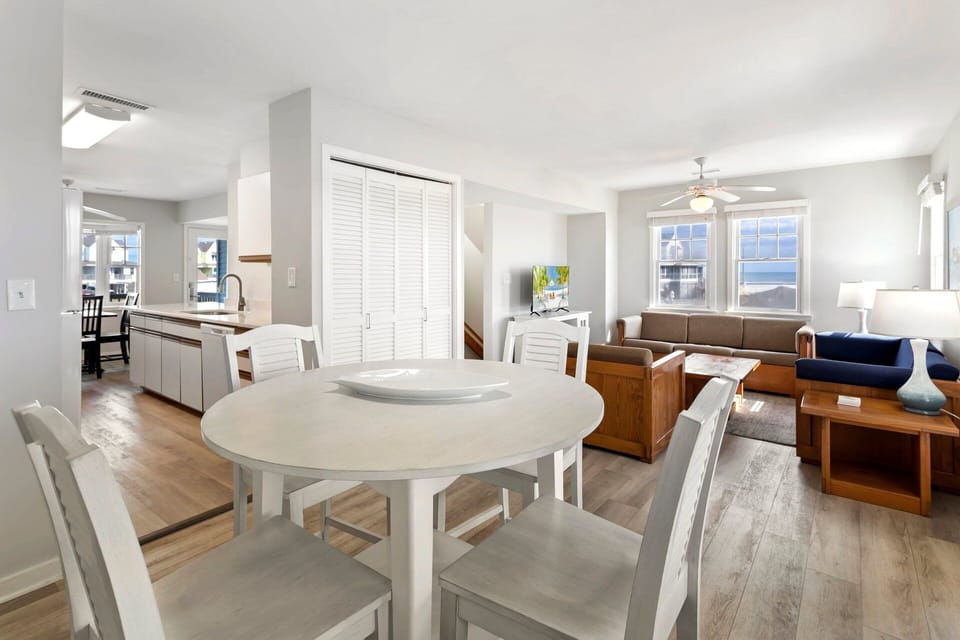Gather for meals, games, or family time in this inviting dining space just off the kitchen.