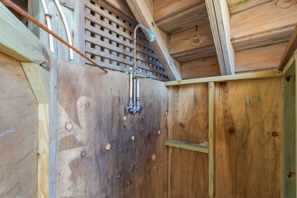 Outdoor Shower – Easy access for post-beach rinse-offs.