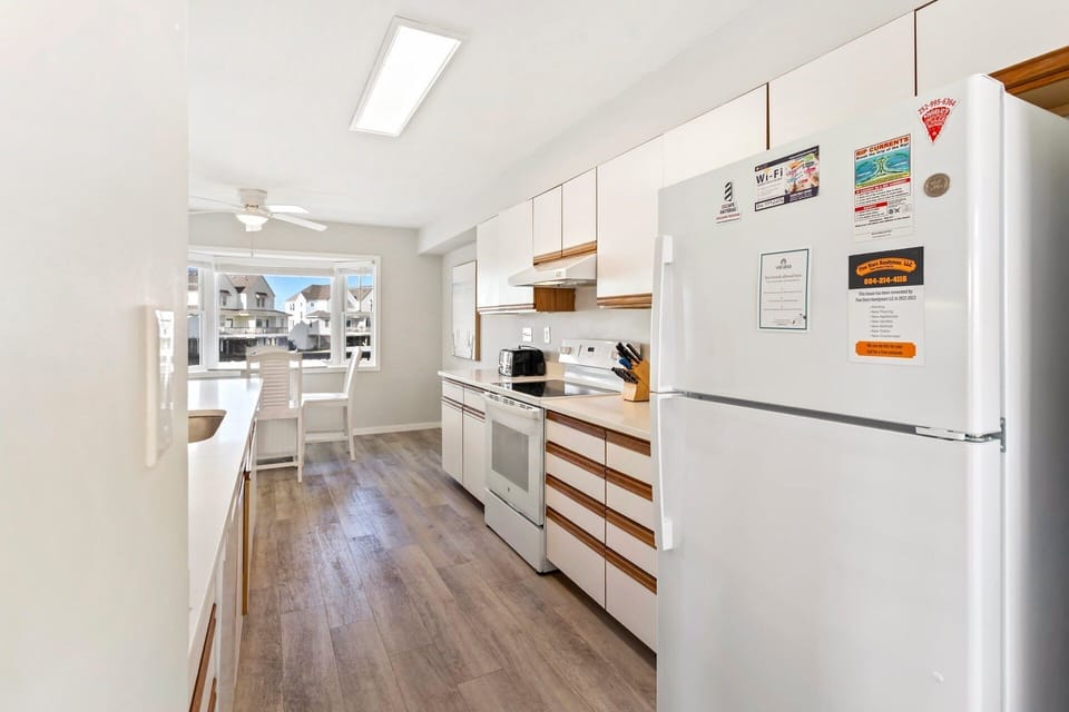 Prepare fresh meals or quick snacks in the well-stocked kitchen with modern appliances.